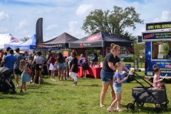 Families visit community booths and activity stations during Cape Coral Kiwanis KidsFest 2025.