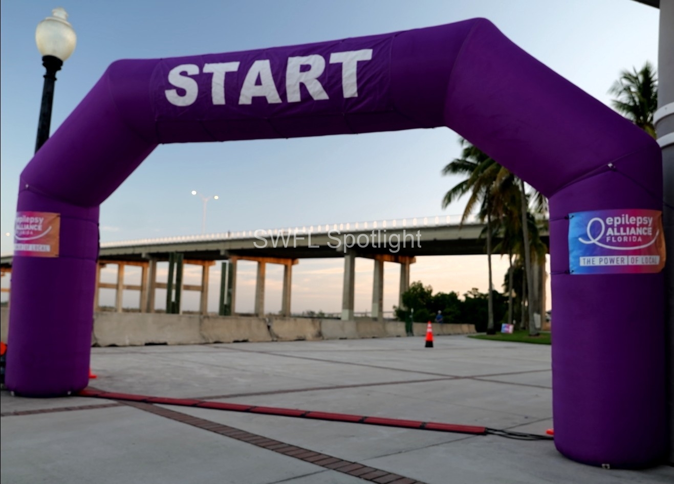 Purple Color Run starting arch at Centennial Park before the inaugural race in Fort Myers.
