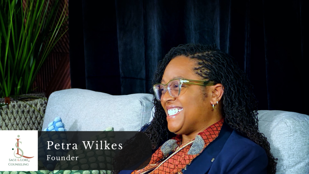 Petra Wilkes, founder of Sage & Lore Counseling, seated for a SWFL Spotlight interview.