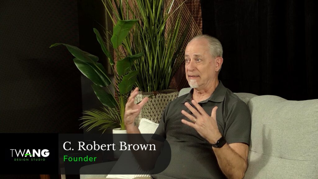 C. Robert Brown, founder of Twang Design Studio, speaking during an interview inside the MelloD Designs production studio in Southwest Florida.